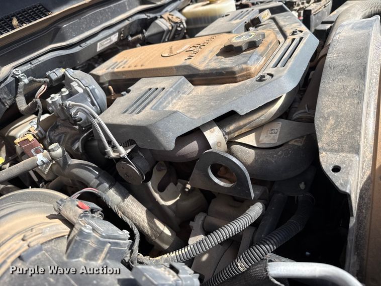 image for item DZ4992 2016 RAM 3500 Crew Cab flatbed pickup truck