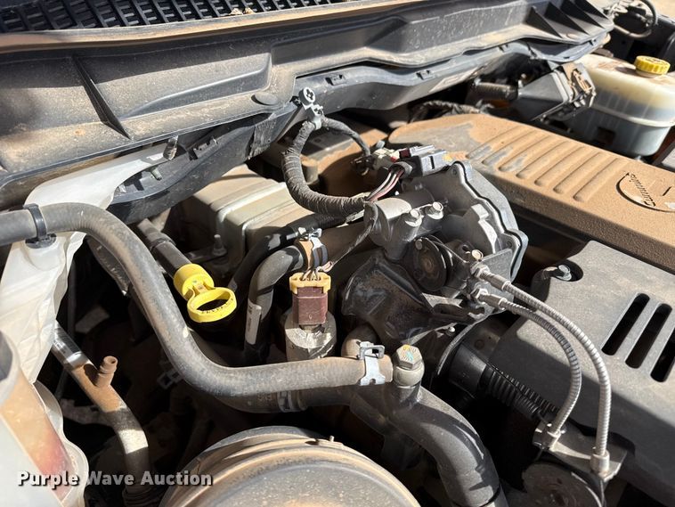 image for item DZ4992 2016 RAM 3500 Crew Cab flatbed pickup truck