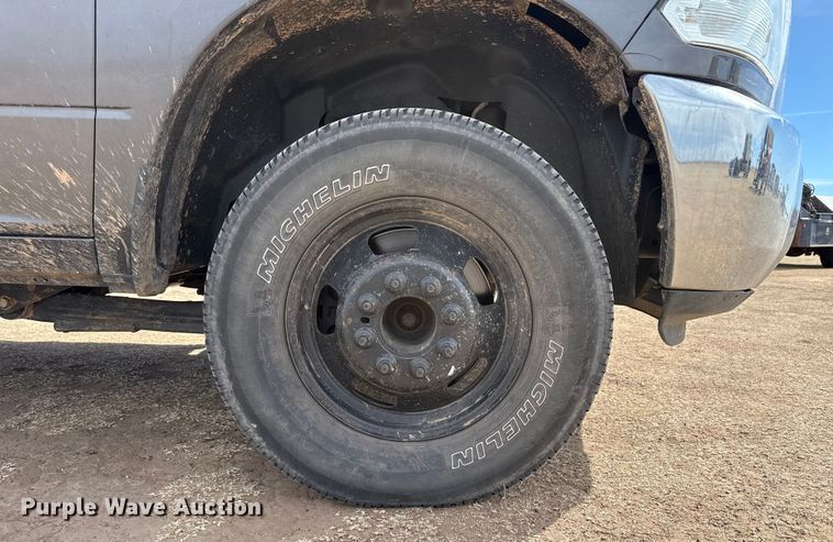 image for item DZ4992 2016 RAM 3500 Crew Cab flatbed pickup truck