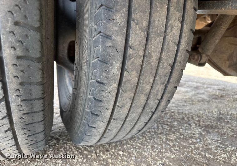 image for item DZ4992 2016 RAM 3500 Crew Cab flatbed pickup truck