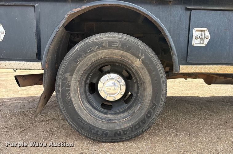 image for item DZ4992 2016 RAM 3500 Crew Cab flatbed pickup truck