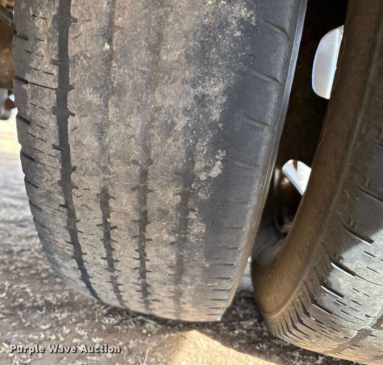 image for item DZ4992 2016 RAM 3500 Crew Cab flatbed pickup truck