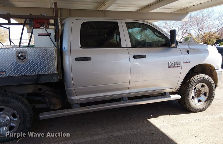 image for item EE5162 2017 RAM 2500 Crew Cab flatbed pickup truck