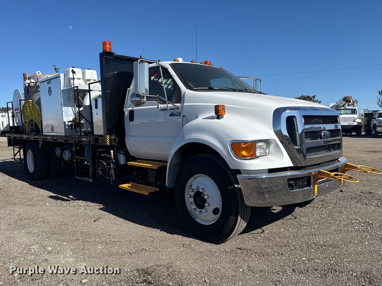 image for item EG2148 2013 Ford F750 Super Duty flatbed truck with PH and chlorine testing system
