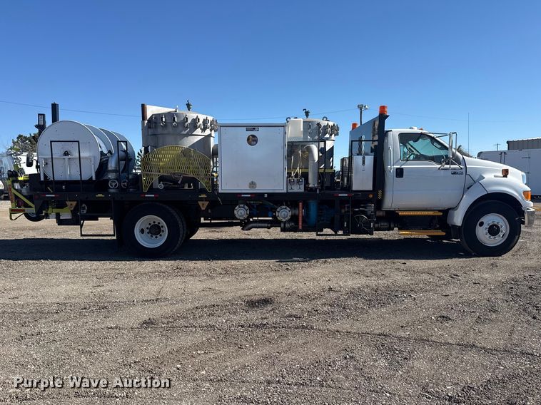 image for item EG2148 2013 Ford F750 Super Duty flatbed truck with PH and chlorine testing system