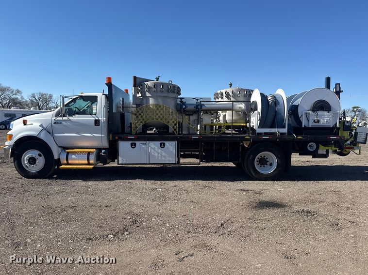 image for item EG2148 2013 Ford F750 Super Duty flatbed truck with PH and chlorine testing system