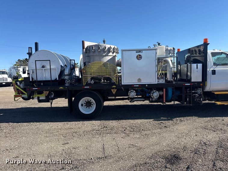 image for item EG2148 2013 Ford F750 Super Duty flatbed truck with PH and chlorine testing system