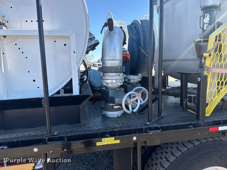 image for item EG2148 2013 Ford F750 Super Duty flatbed truck with PH and chlorine testing system