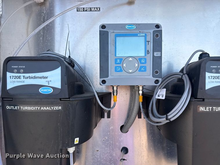 image for item EG2148 2013 Ford F750 Super Duty flatbed truck with PH and chlorine testing system