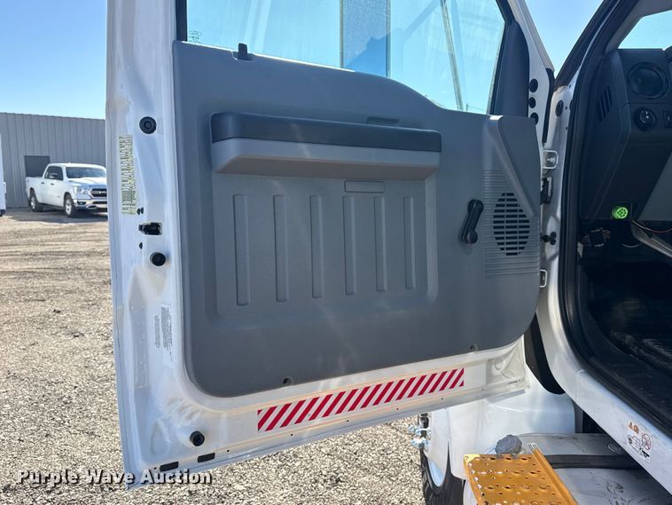 image for item EG2148 2013 Ford F750 Super Duty flatbed truck with PH and chlorine testing system