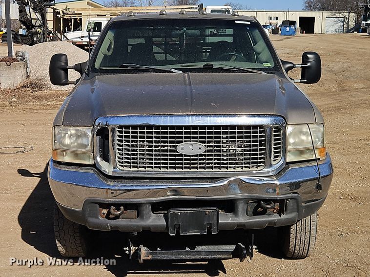 image for item EO7015 2000 Ford F350 Super Duty Ext. Cab flatbed pickup truck