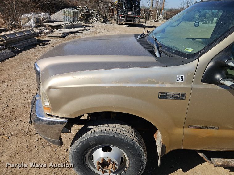 image for item EO7015 2000 Ford F350 Super Duty Ext. Cab flatbed pickup truck