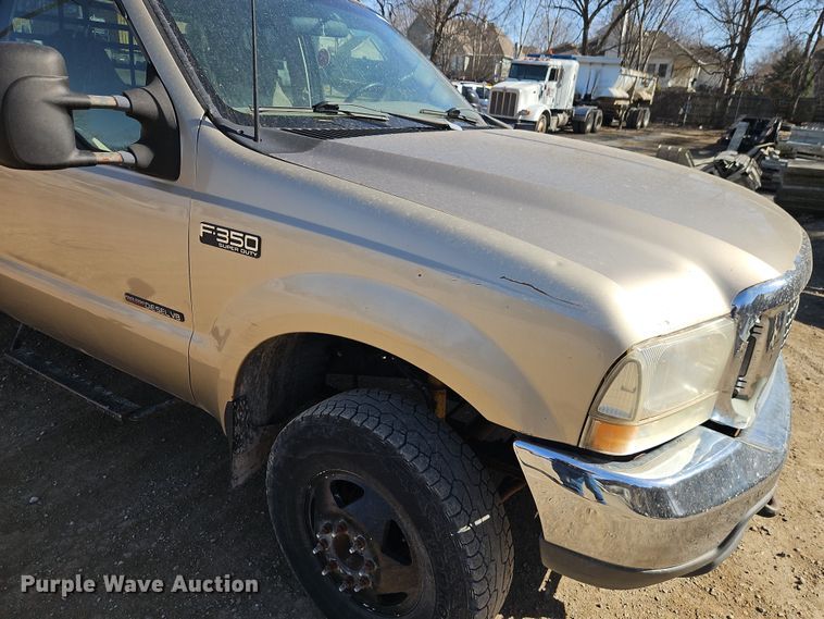 image for item EO7015 2000 Ford F350 Super Duty Ext. Cab flatbed pickup truck