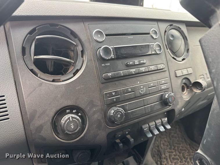 image for item ET1551 2015 Ford F350 Crew Cab flatbed pickup truck