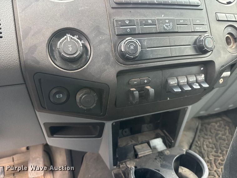 image for item ET1551 2015 Ford F350 Crew Cab flatbed pickup truck