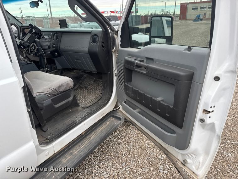 image for item ET1551 2015 Ford F350 Crew Cab flatbed pickup truck