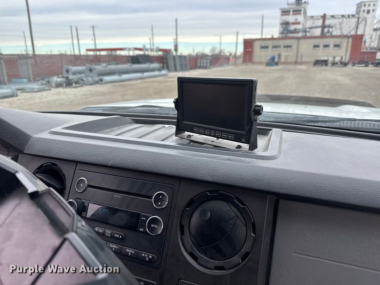 image for item ET1551 2015 Ford F350 Crew Cab flatbed pickup truck