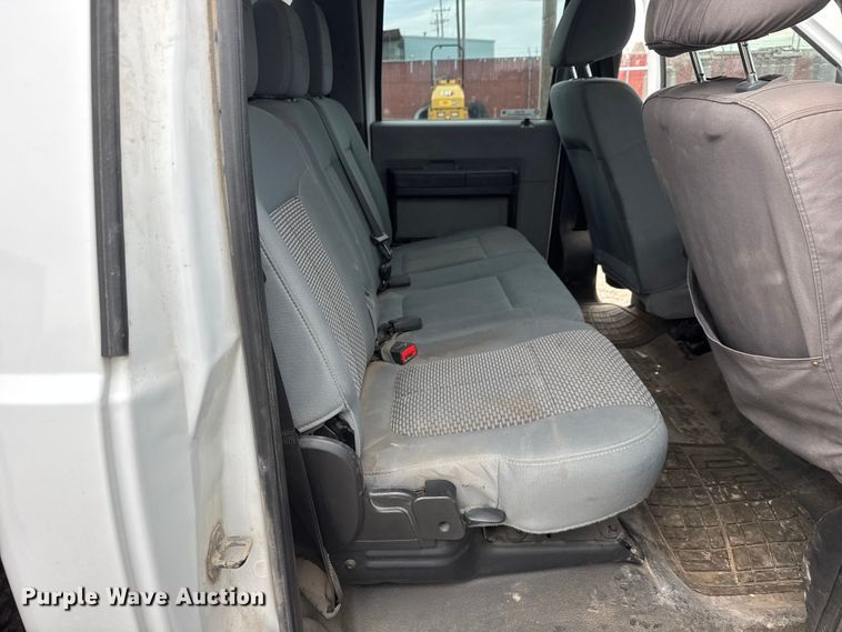 image for item ET1551 2015 Ford F350 Crew Cab flatbed pickup truck