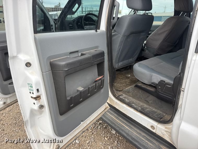 image for item ET1551 2015 Ford F350 Crew Cab flatbed pickup truck