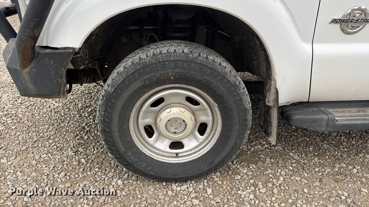 image for item ET1551 2015 Ford F350 Crew Cab flatbed pickup truck