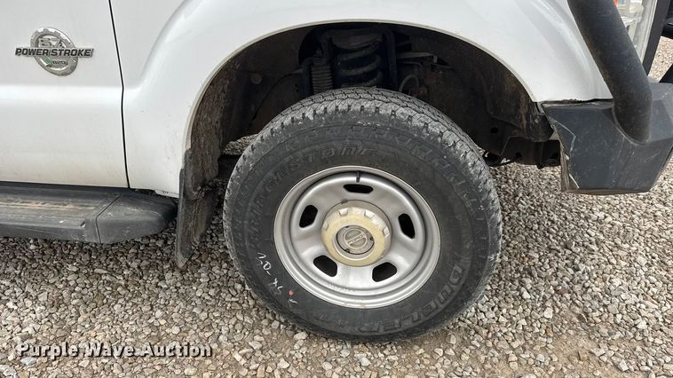 image for item ET1551 2015 Ford F350 Crew Cab flatbed pickup truck