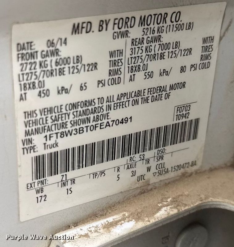 image for item ET1551 2015 Ford F350 Crew Cab flatbed pickup truck