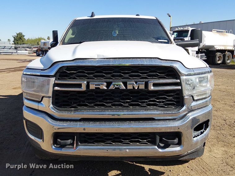 image for item EU2634 2020 RAM 3500 Crew Cab flatbed pickup truck