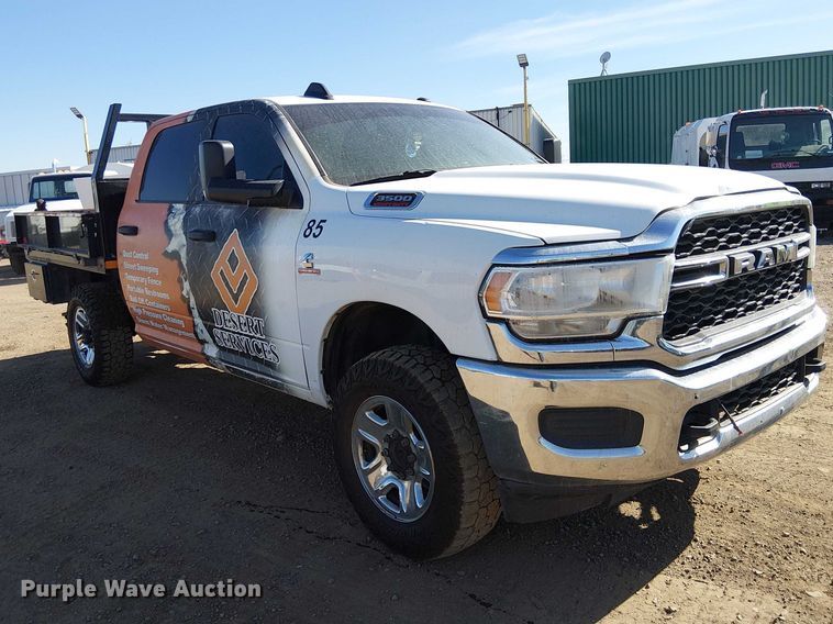 image for item EU2634 2020 RAM 3500 Crew Cab flatbed pickup truck