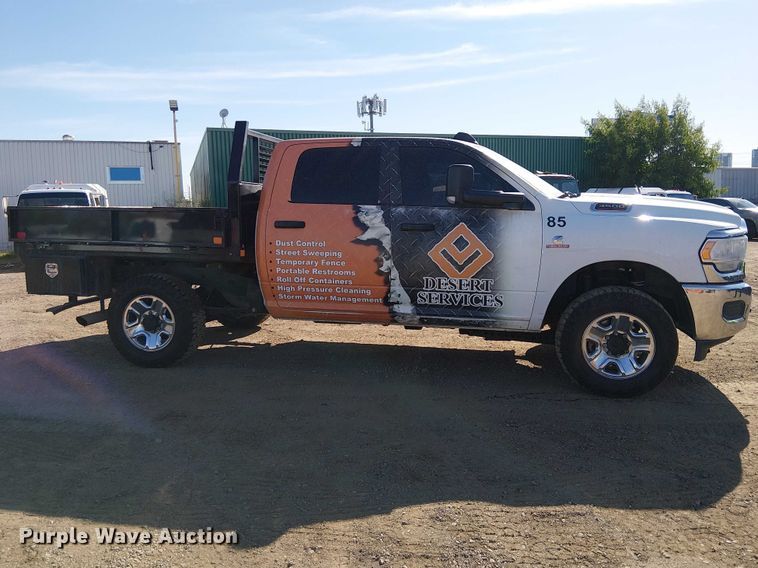 image for item EU2634 2020 RAM 3500 Crew Cab flatbed pickup truck