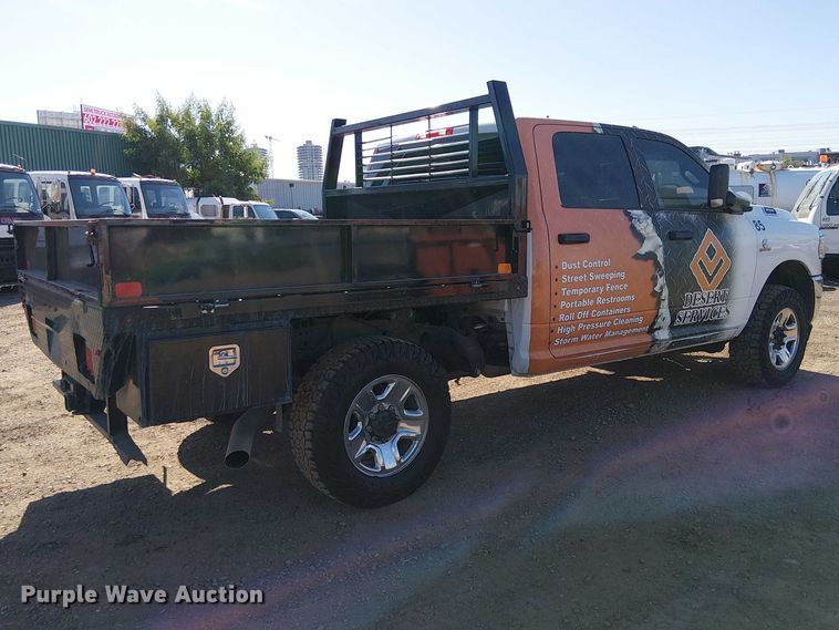 image for item EU2634 2020 RAM 3500 Crew Cab flatbed pickup truck