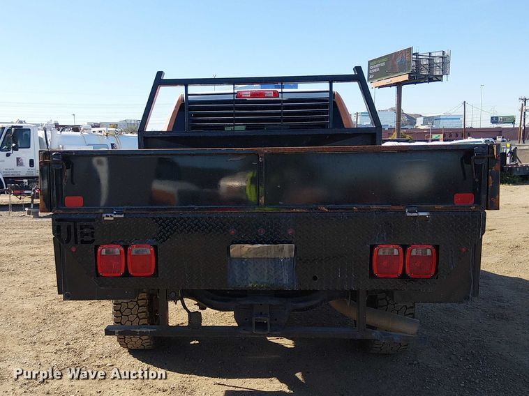 image for item EU2634 2020 RAM 3500 Crew Cab flatbed pickup truck