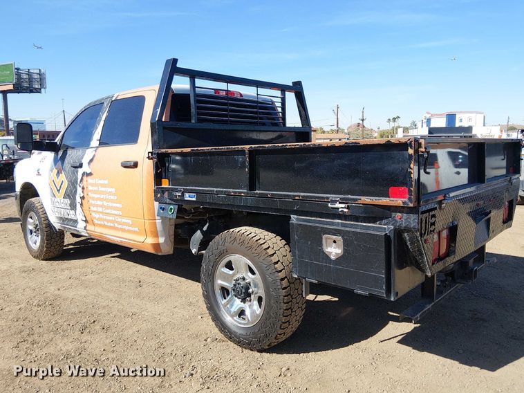 image for item EU2634 2020 RAM 3500 Crew Cab flatbed pickup truck