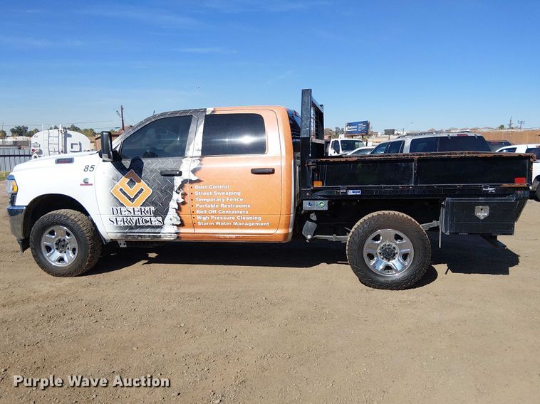 image for item EU2634 2020 RAM 3500 Crew Cab flatbed pickup truck
