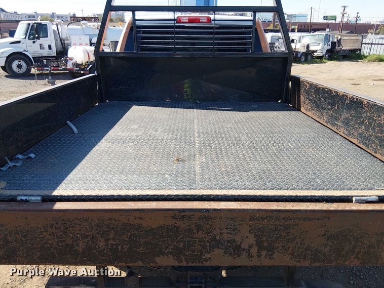 image for item EU2634 2020 RAM 3500 Crew Cab flatbed pickup truck