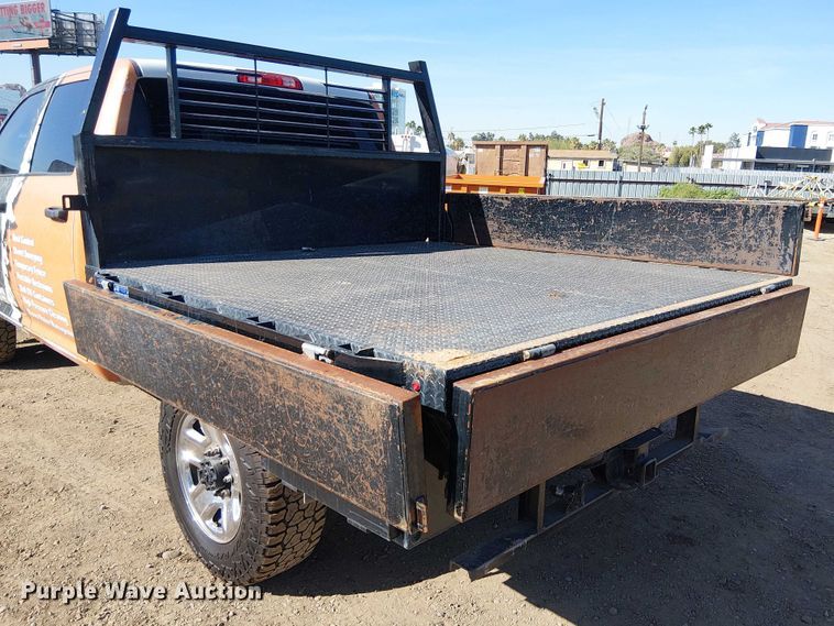 image for item EU2634 2020 RAM 3500 Crew Cab flatbed pickup truck