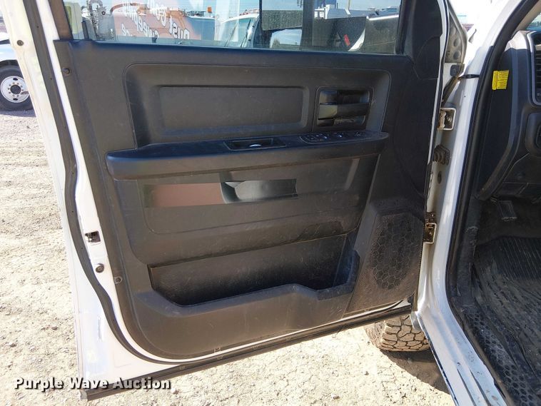 image for item EU2634 2020 RAM 3500 Crew Cab flatbed pickup truck