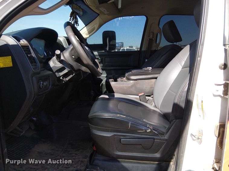 image for item EU2634 2020 RAM 3500 Crew Cab flatbed pickup truck