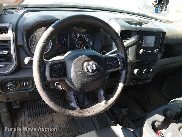 image for item EU2634 2020 RAM 3500 Crew Cab flatbed pickup truck