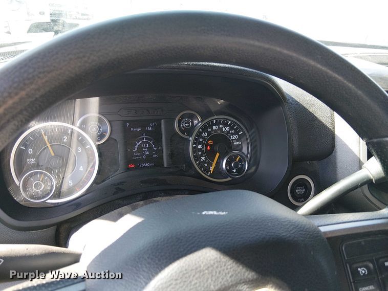 image for item EU2634 2020 RAM 3500 Crew Cab flatbed pickup truck