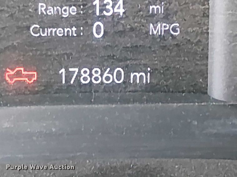 image for item EU2634 2020 RAM 3500 Crew Cab flatbed pickup truck