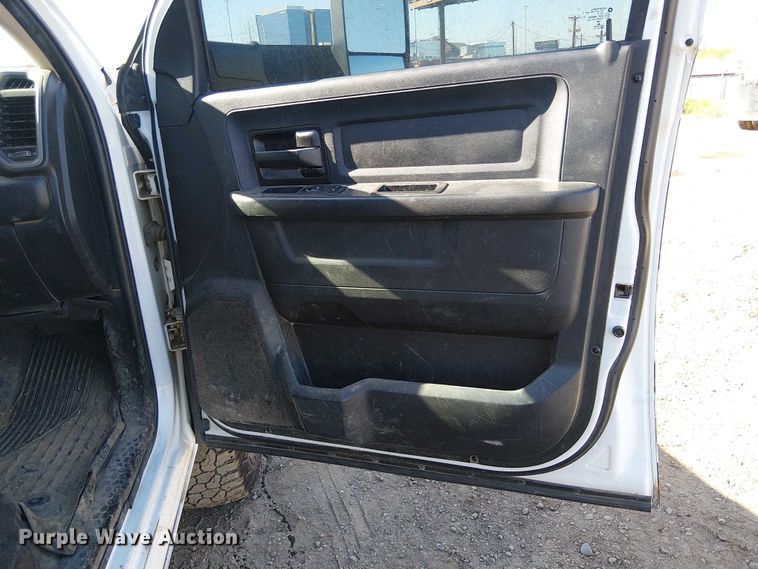 image for item EU2634 2020 RAM 3500 Crew Cab flatbed pickup truck