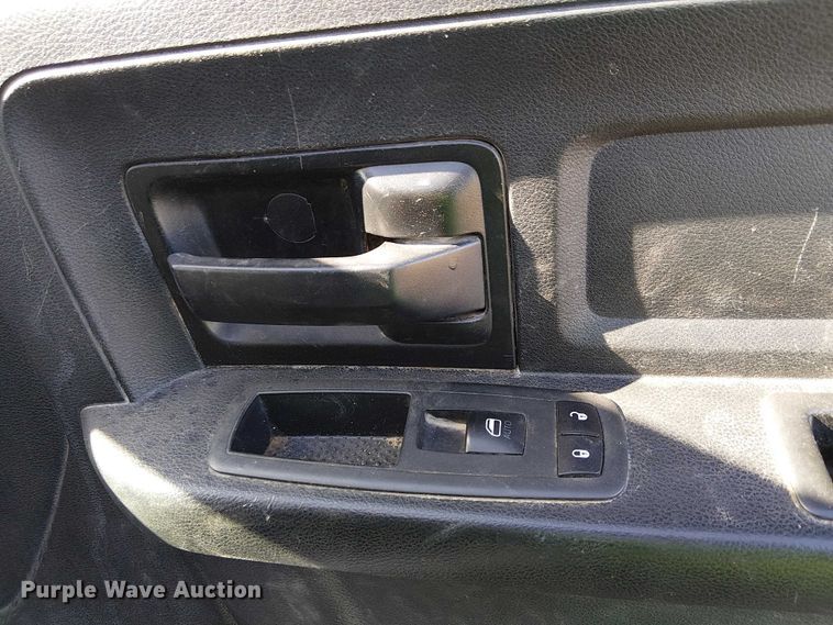 image for item EU2634 2020 RAM 3500 Crew Cab flatbed pickup truck