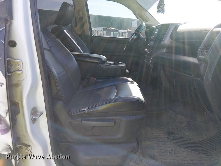 image for item EU2634 2020 RAM 3500 Crew Cab flatbed pickup truck