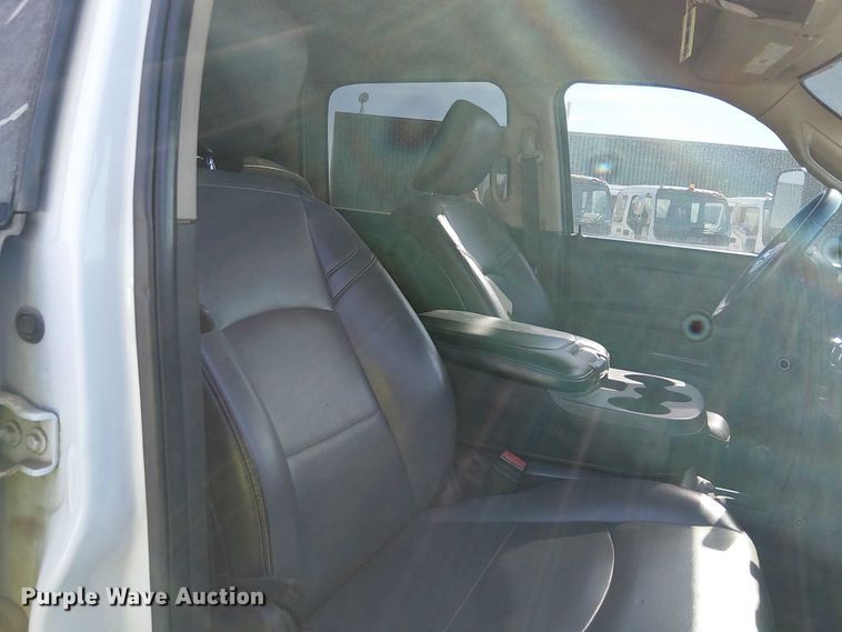 image for item EU2634 2020 RAM 3500 Crew Cab flatbed pickup truck