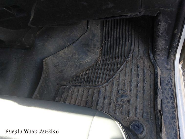 image for item EU2634 2020 RAM 3500 Crew Cab flatbed pickup truck