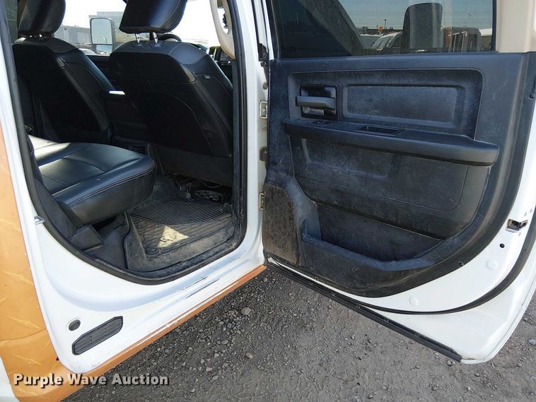 image for item EU2634 2020 RAM 3500 Crew Cab flatbed pickup truck