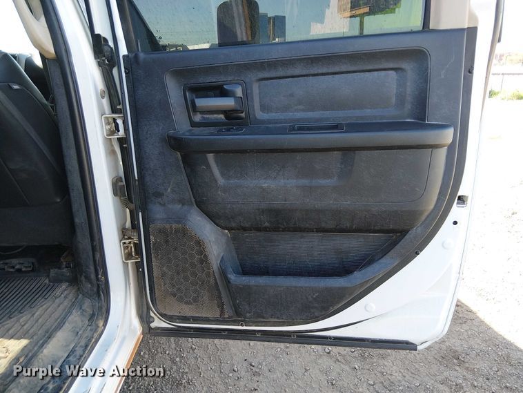 image for item EU2634 2020 RAM 3500 Crew Cab flatbed pickup truck