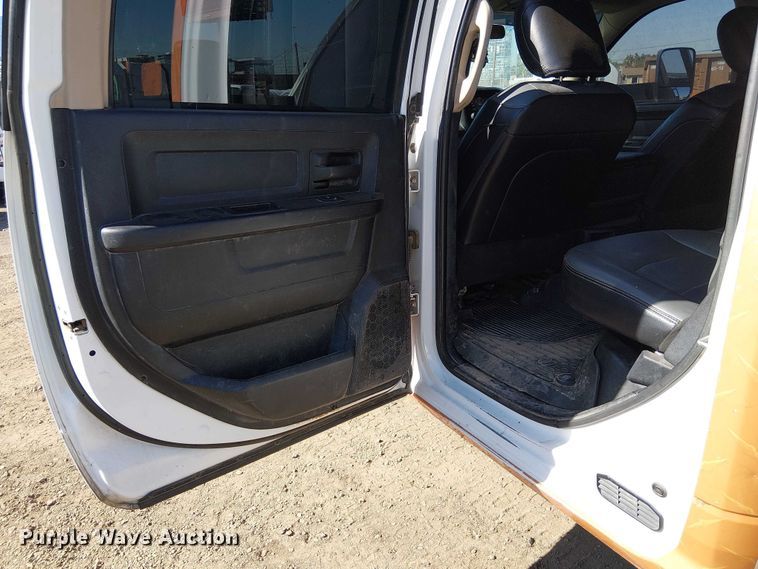 image for item EU2634 2020 RAM 3500 Crew Cab flatbed pickup truck