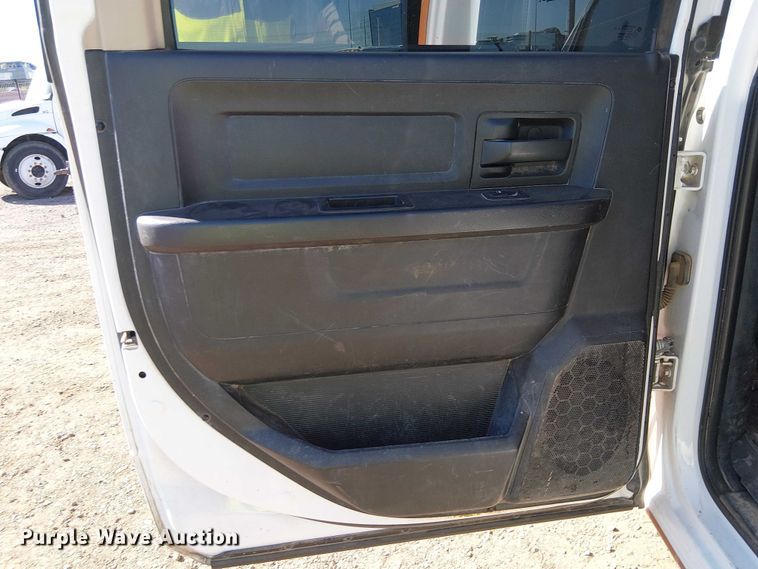 image for item EU2634 2020 RAM 3500 Crew Cab flatbed pickup truck