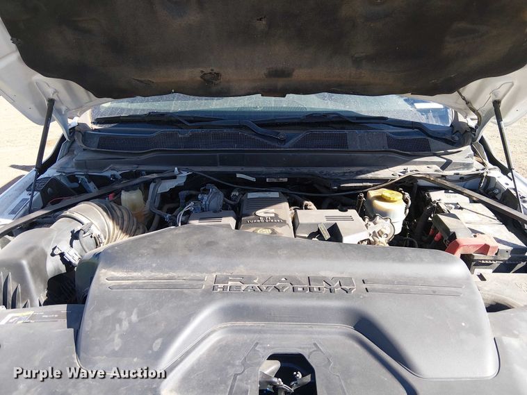 image for item EU2634 2020 RAM 3500 Crew Cab flatbed pickup truck